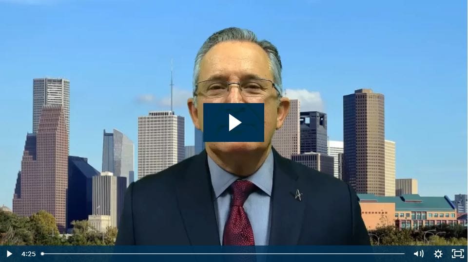 Man in suit in front of city skyline video thumbnail.