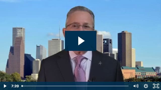 Businessman with skyline background discussing finance.