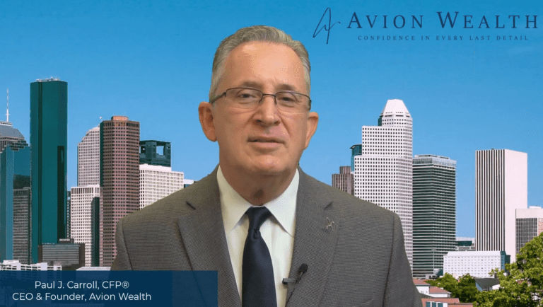 Business professional in suit with urban skyline background.