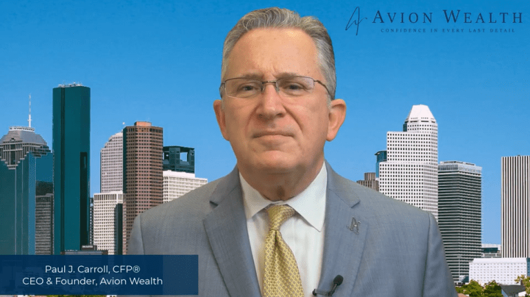 Man in suit with a city skyline backdrop and Avion Wealth logo displayed.