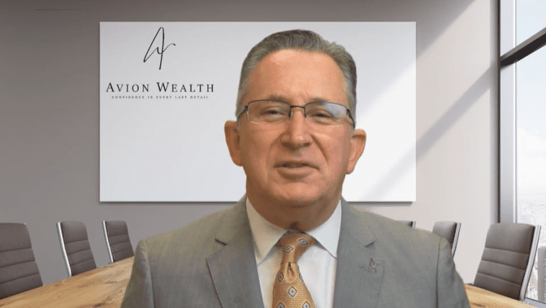 Businessman in a conference room with Avion Wealth logo in the background.