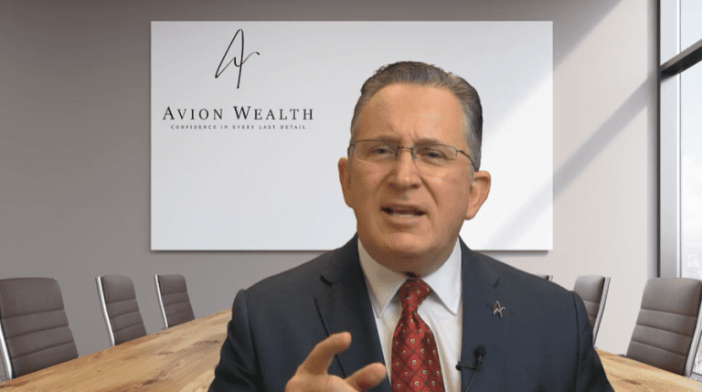 Avion Wealth executive speaking in a boardroom setting.