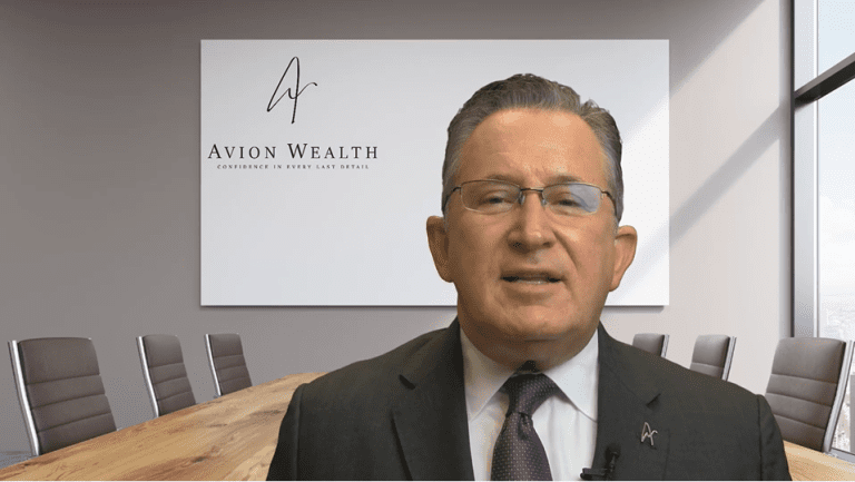 Person in suit speaking at Avion Wealth office conference room.
