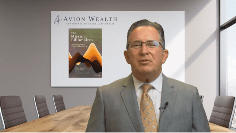 Businessman presenting The Missing Billionaires book in a conference room.