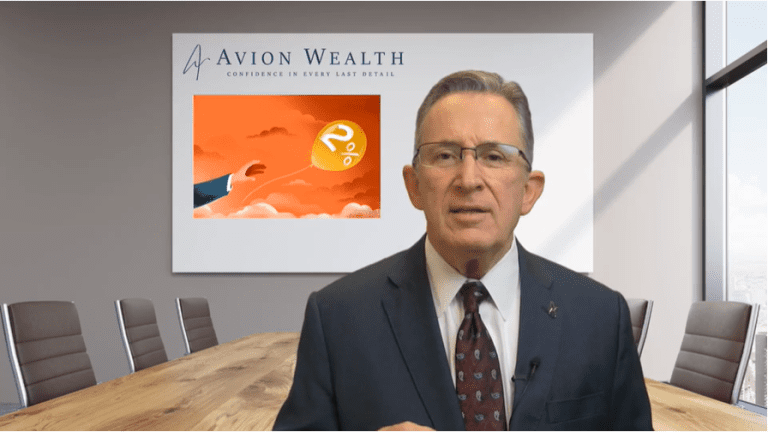 Businessman presents in Avion Wealth meeting room.