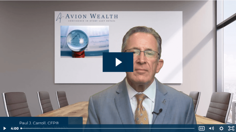 Businessman speaking in a corporate video conference room.