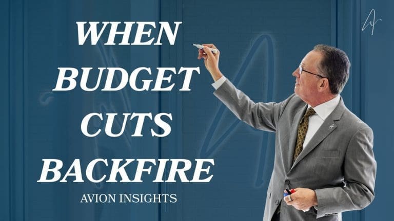 Man writing on glass board, text reads When Budget Cuts Backfire.